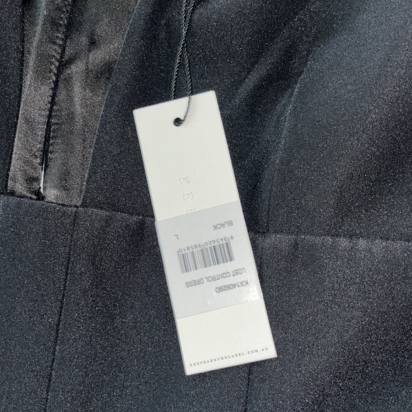 (A) New with tags size large (fits like a medium) black dress - Picture 3 of 5